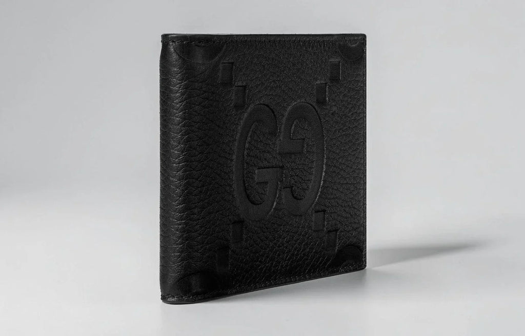 Gucci Jumbo GG Embossed Black Leather Bifold Wallet
